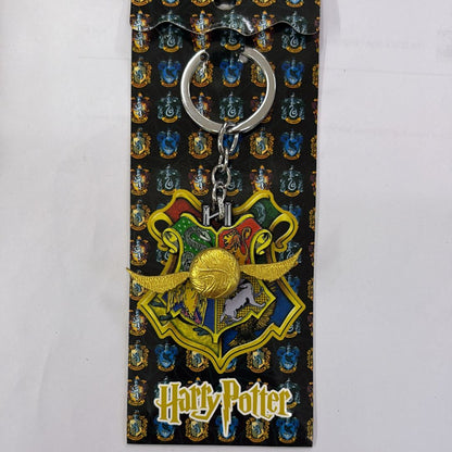 Harry Potter Quidditch Snitch On Hogwarts House Crest Rotating Keychain with Bagcharm