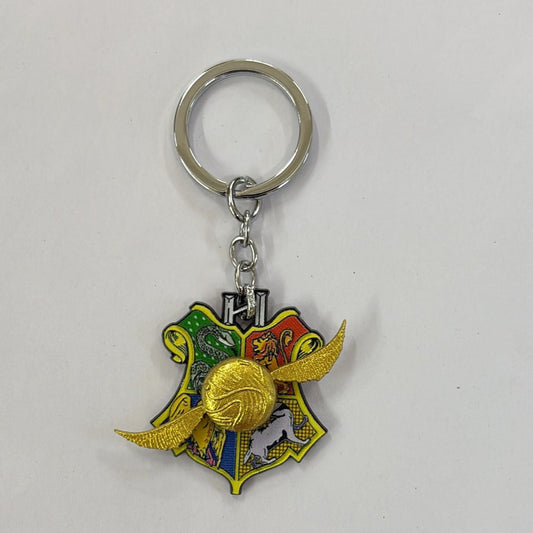 Harry Potter Quidditch Snitch On Hogwarts House Crest Rotating Keychain with Bagcharm