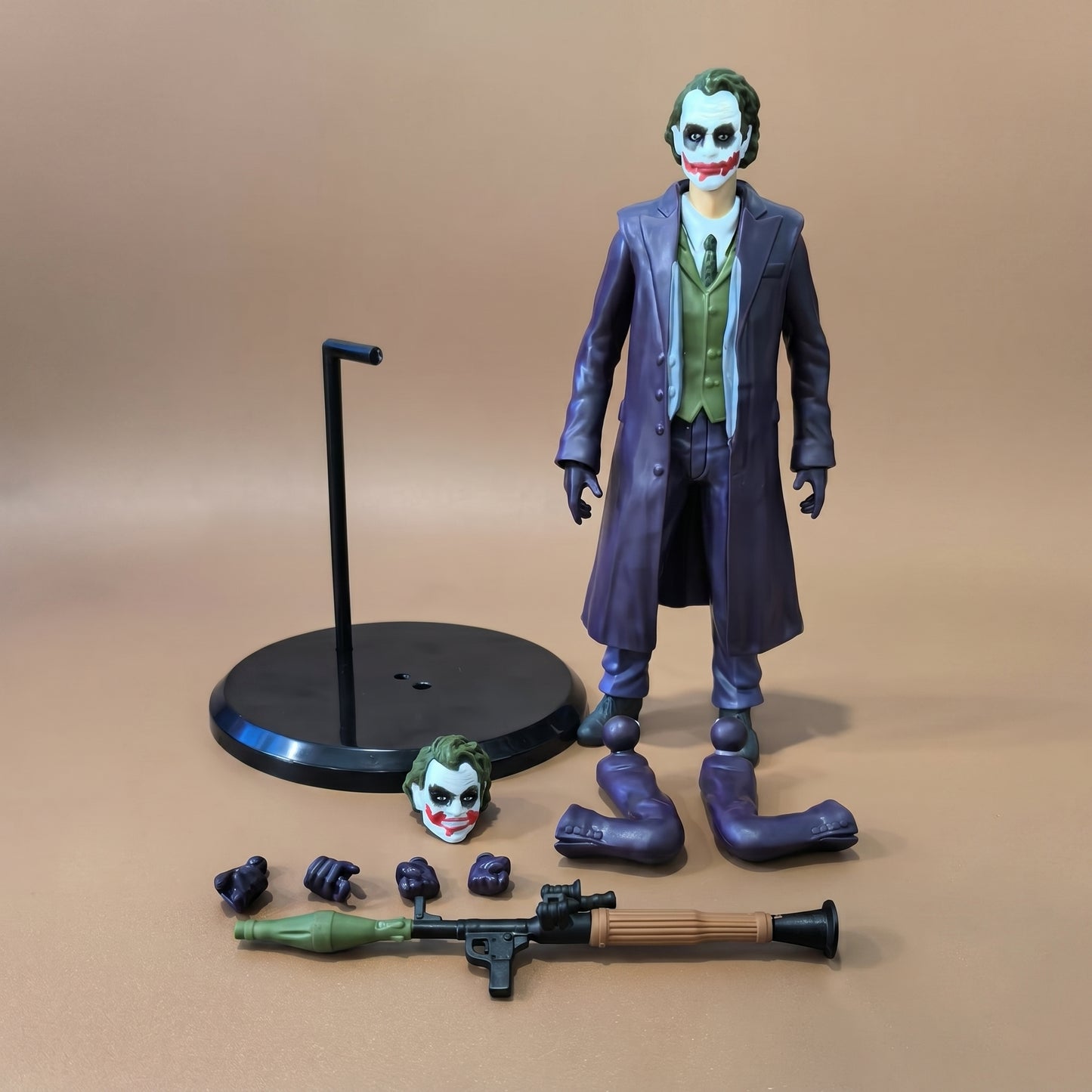 Joker Action Figure with Accessories – Collectible Villain Figure Toy with Weapon Set & Display Stand